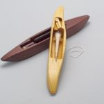 Two wooden boat shuttles for spinning